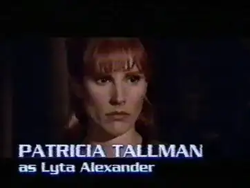 credits line for a red-haired woman reading "Patricia TALLMAN as Lyra Alexander"