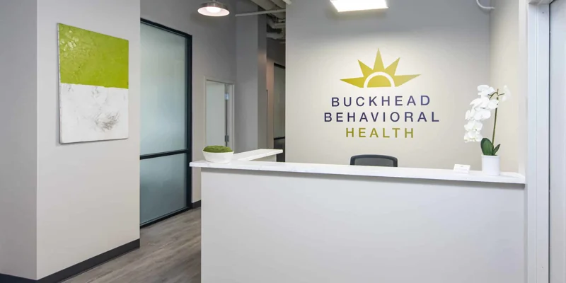 A reception desk at Buckhead Behavioral Health with modern decor.