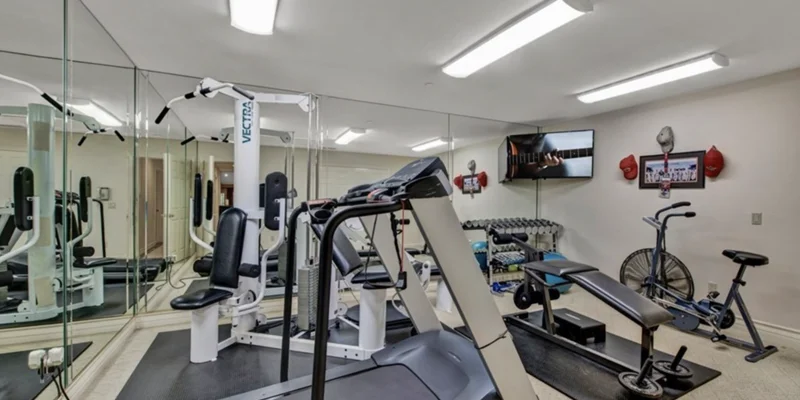 Gym with exercise equipment.