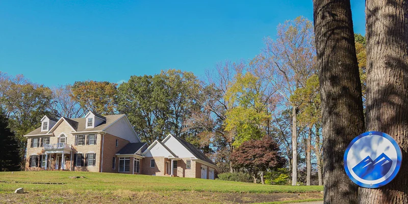 Front exterior of teen treatment center with green lawn