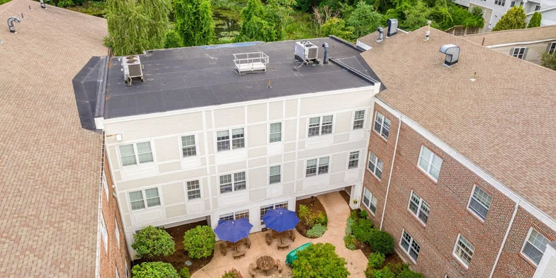  Aerial view facility courtyard with shaded seating.
