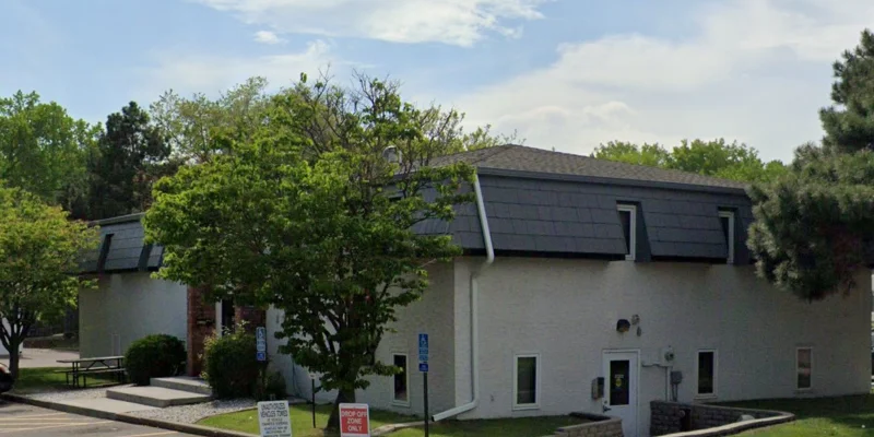 Street view of facility with accessible parking.