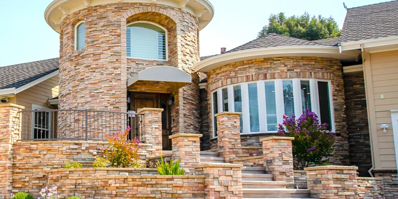 Facility front with stone stair entrance.