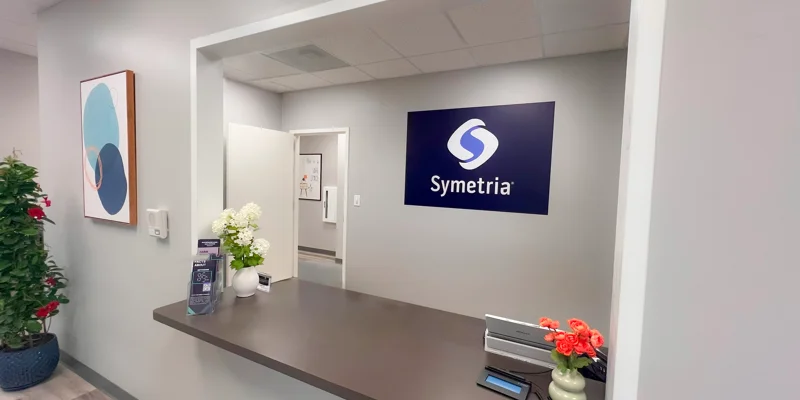 Reception area with Symetria logo