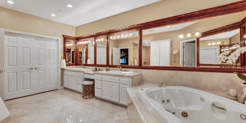 Bathroom with a vanity and tub.