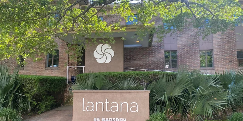 Exterior of Lantana Recovery with brick walls and green landscaping.