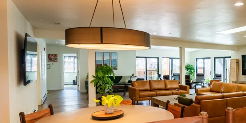 Cozy dining area next to bright living room