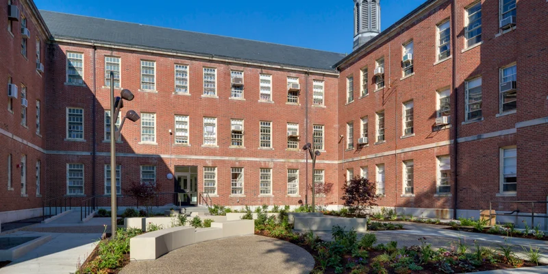 Front view of the rehab facility building with a welcoming entrance.