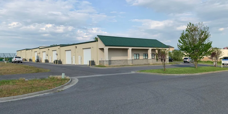 Facility exterior with entrance and accessible parking.