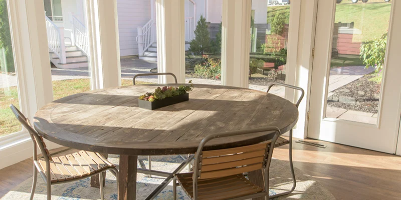 Dining area with a table and chairs.