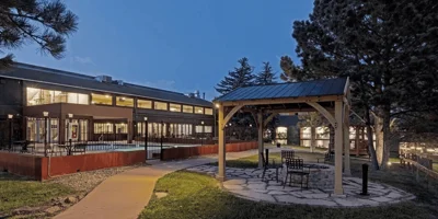 Outdoor gazebo, fire pit, and seating.