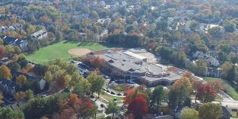 Aerial view of facility in private neighbourhood.
