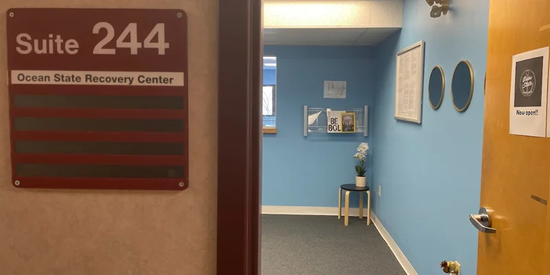 Entrance to with waiting area and reception in view.