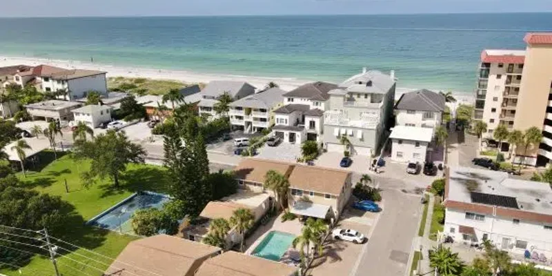 Aerial view of a facility neighborhood, showing homes.