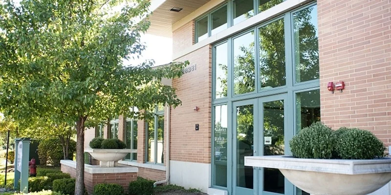 Facility with glass doors and signage.