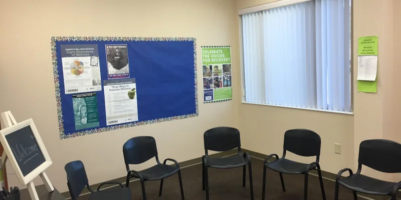 Group therapy room with chairs in a circle.