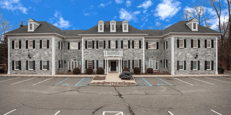 Main building entrance at rolling hills with accessible parking
