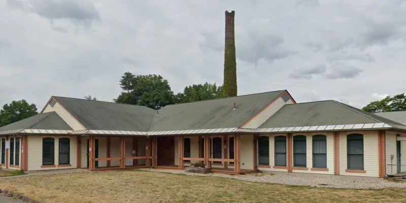 Front view of the rehab facility building with a welcoming entrance.
