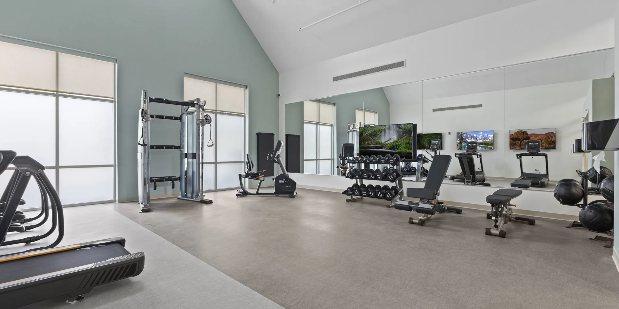 A well-equipped fitness gym with exercise machines.