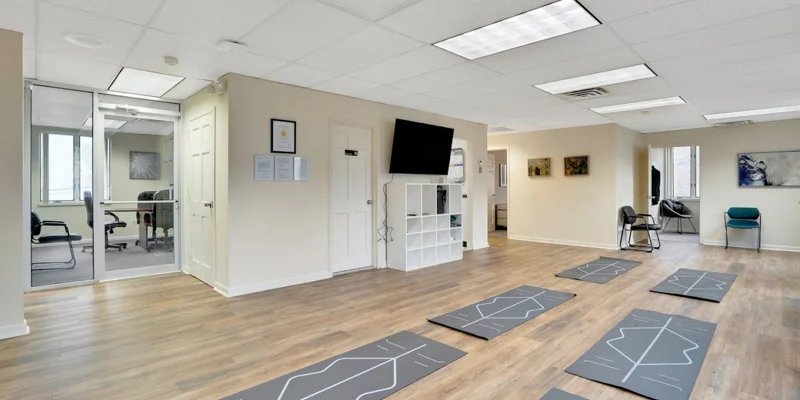 Yoga and meditation room with floor mats.