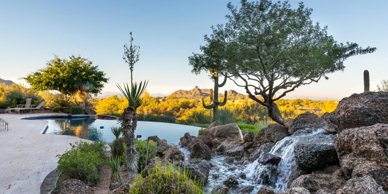 Infinity pool with desert landscape.