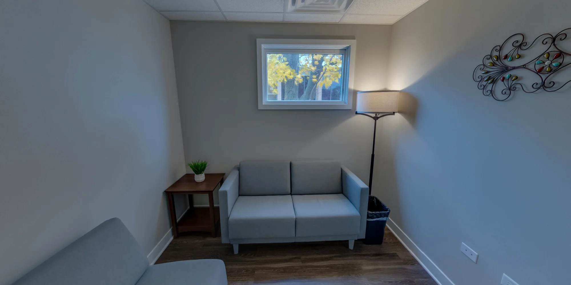 Group therapy room arranged with chairs.