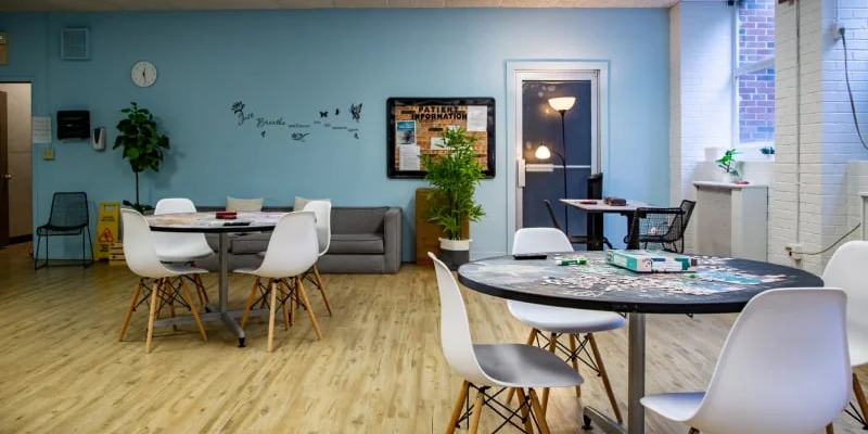 Recreational room with puzzles on tables.