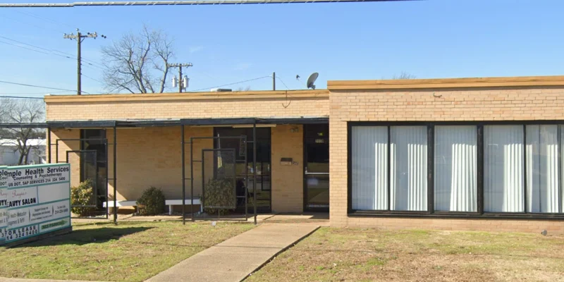 The front entrance of Remedy Behavioral Systems, with clean lines and clear identification signage.