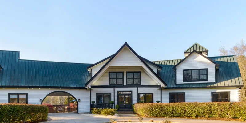 Facility front with entrance and driveway.
