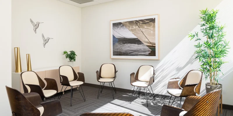 Therapy room with chairs arranged in a circle.