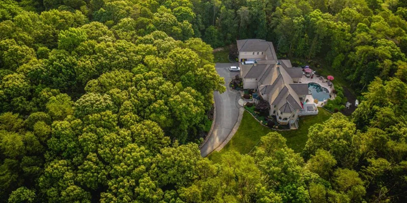Aerial view of a rehab facility surrounded by woods