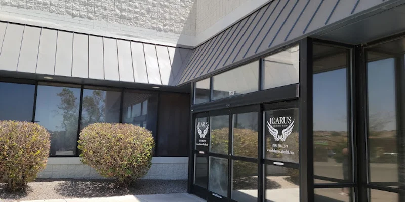 Entrance to the rehab center with large glass pane doors..