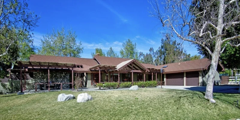 Facility front entrance with accessible parking.
