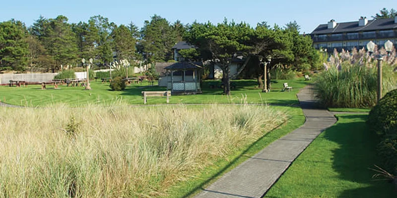 A peaceful outdoor setting with a gazebo and walking path.