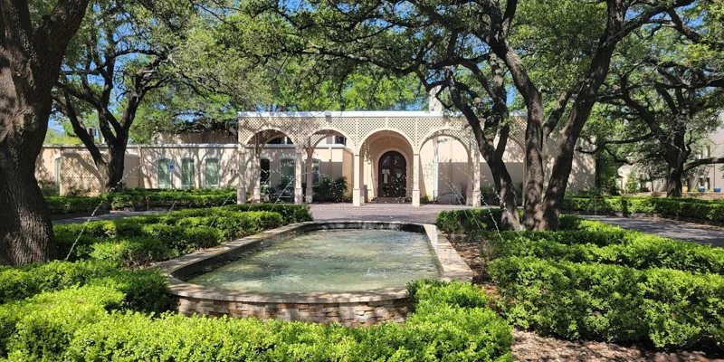 A landscaped courtyard with a water fountain.