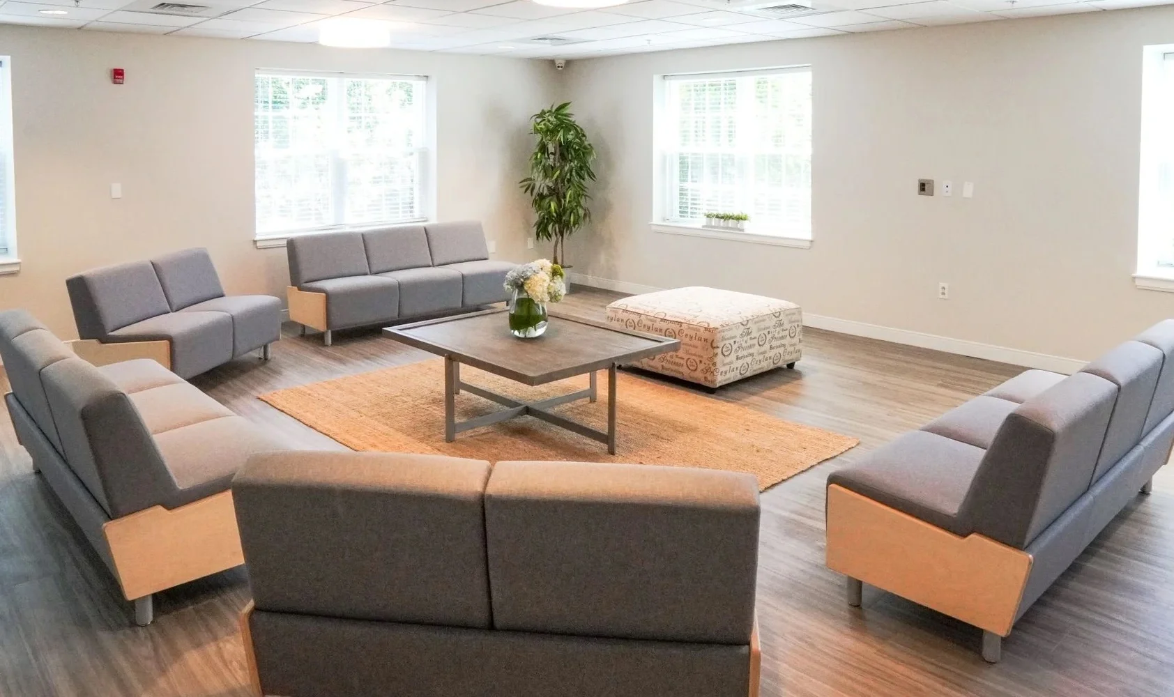 Common area with seating around a table.