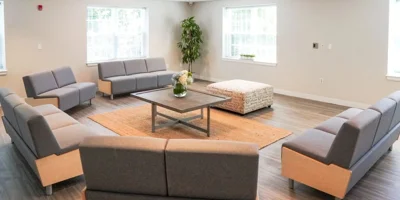 Common area with seating around a table.