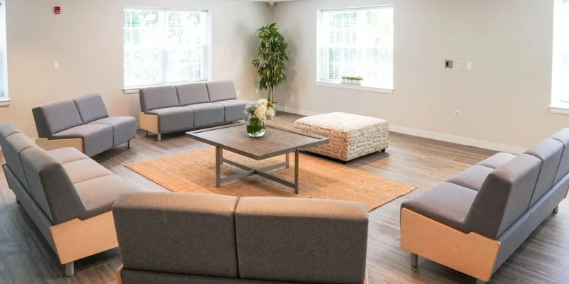Common area with seating around a table.