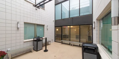 Outdoor area with benches natural light.