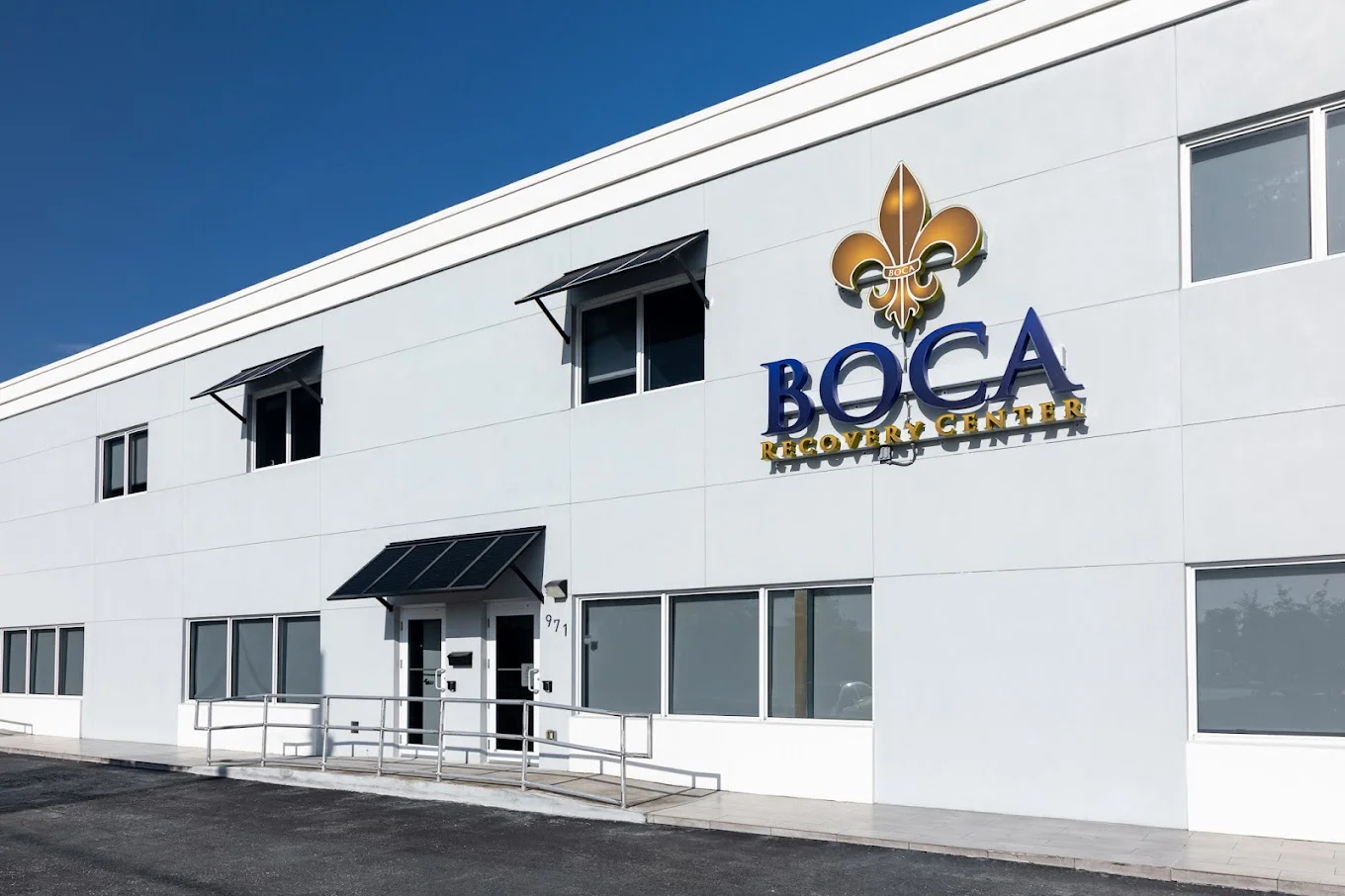 Facility exterior with signage and an accessible entrance.