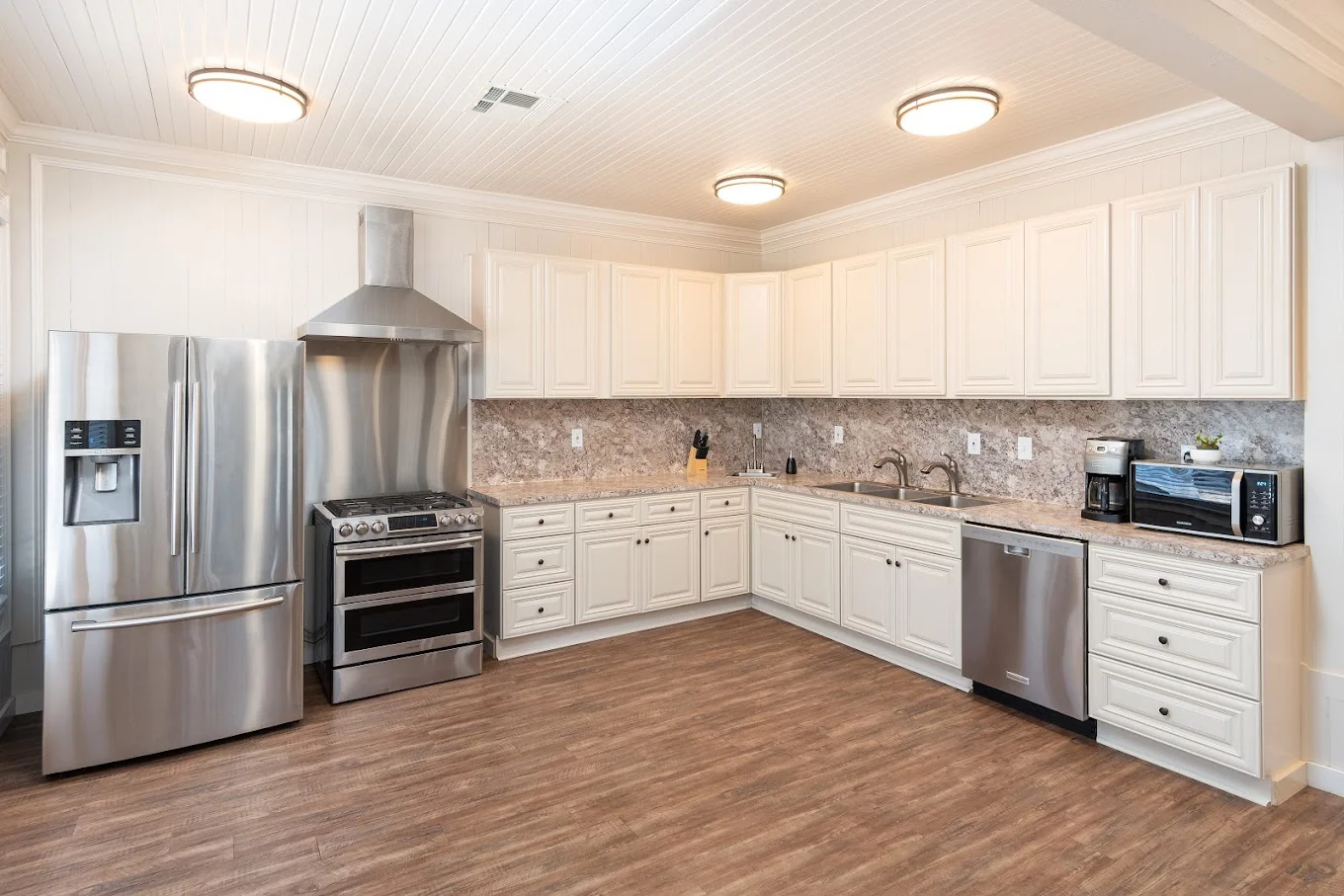 Kitchen with equipment, and a countertop.