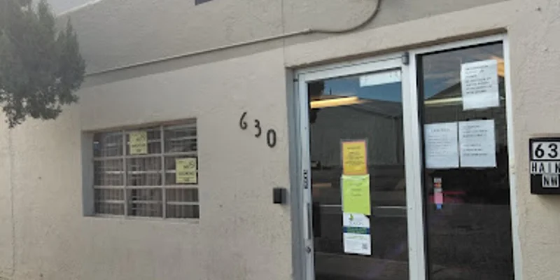 Entrance of facility with signage.