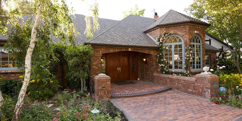 Facility entrance with paved walkway.