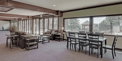 Lounge with seating and a dining area.