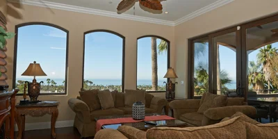   Living room with ocean views and elegant decor.
