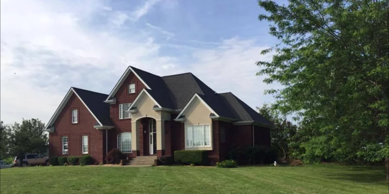 Exterior view of the rehab facility on a lawn.