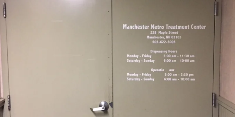 Entrance with signage on door.