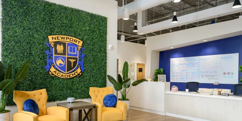 Reception area with signage and seating.