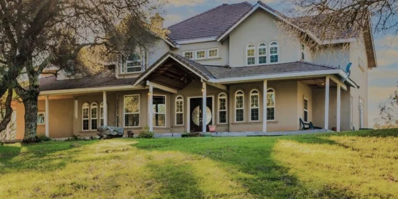 Facility exterior with a porch and entrance in view.