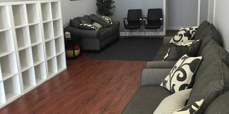 Lounge area with sofas and armchairs.